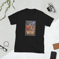 Black t-shirt printed with a horror movie poster of an orange jack-o'-lantern candy pail tipped over on a wet street, spilling wrapped candy as a skeletal hand of ash rises toward a full moon, under the orange title "When the Candy Turns to Ash."