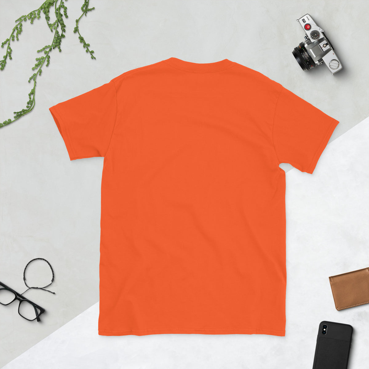 Back of the plain orange t-shirt, no print, laid flat.